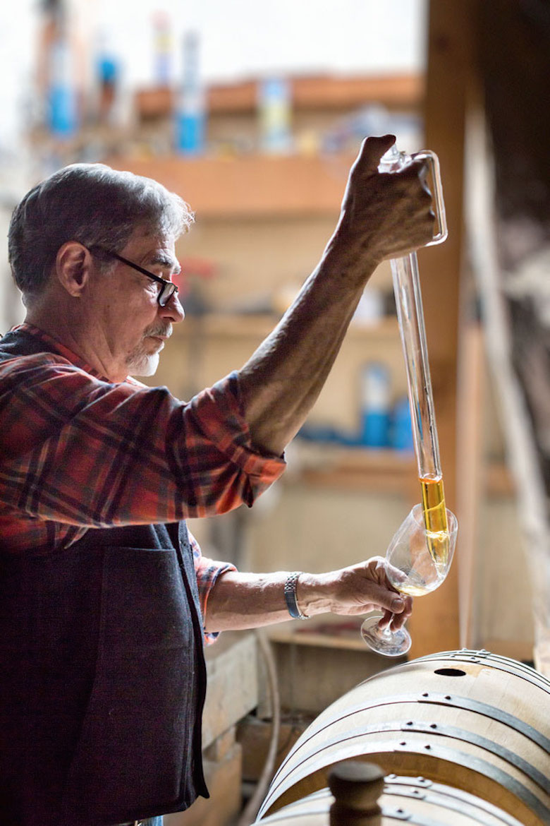 Duncan Holaday sampling his rum at Dunc's Mill. Photo credit/Dunc's Mill.