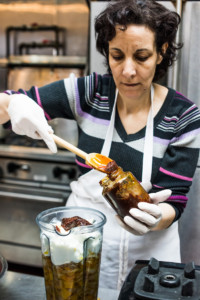 Eat Offbeat - Bahia adding yogurt and jam to the blender to make a sauce.