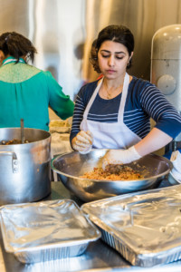 Eat Offbeat - Dhuha tossing rice.