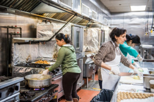 Eat Offbeat - Dhuha, bahia and lauren working in the kitchen together.