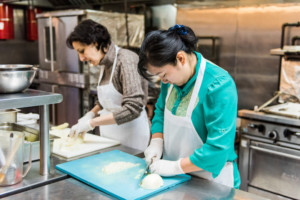 Eat Offbeat - Bahia and Lauren chopping onions.