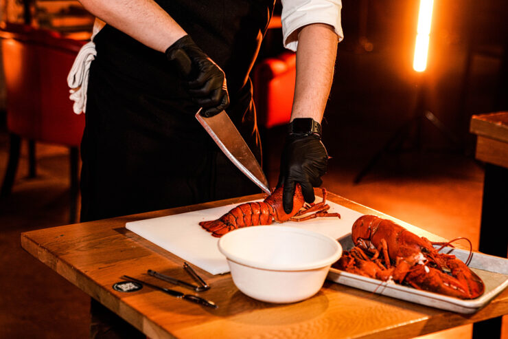 chef danny lee breaking down a lobster
