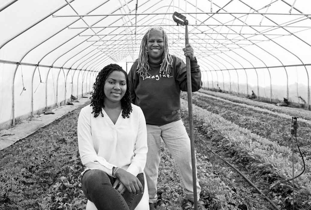 black and white portrait of karen washington and olivia watkins in a greenhouse