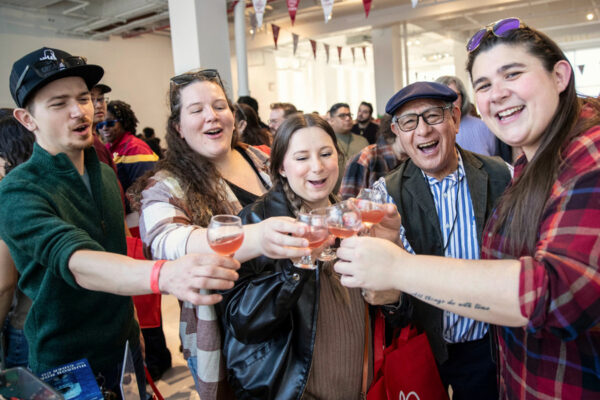 a group of people enjoying a cider festival